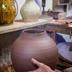 Doug Fitch and Hannah McAndrew making a jug for me